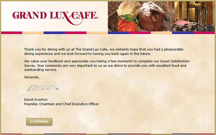 Go to the Grand Lux Cafe Survey website using your device.